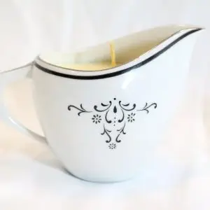 Ola Balms lotion candle showing side pour design