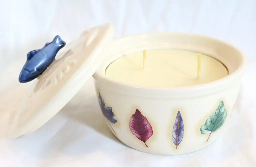 Ola Balms lotion candle showing lid off