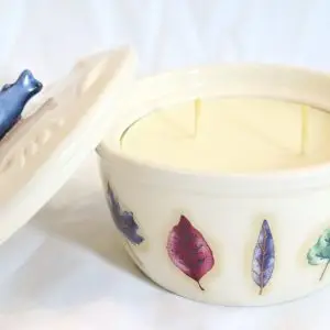 Ola Balms lotion candle showing lid off
